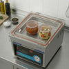 Chamber vacuum sealer that vacuums jars