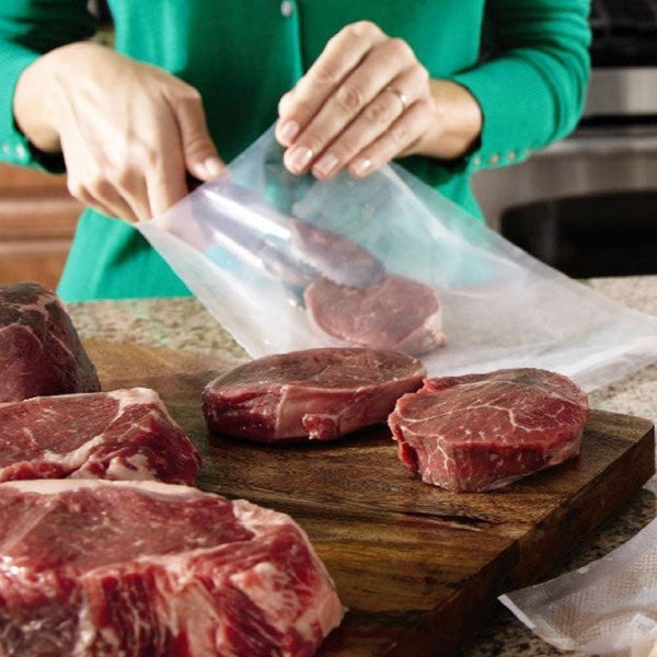 Machine pour mettre la viande sous vide