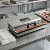 Delicatessen vacuum sealer
