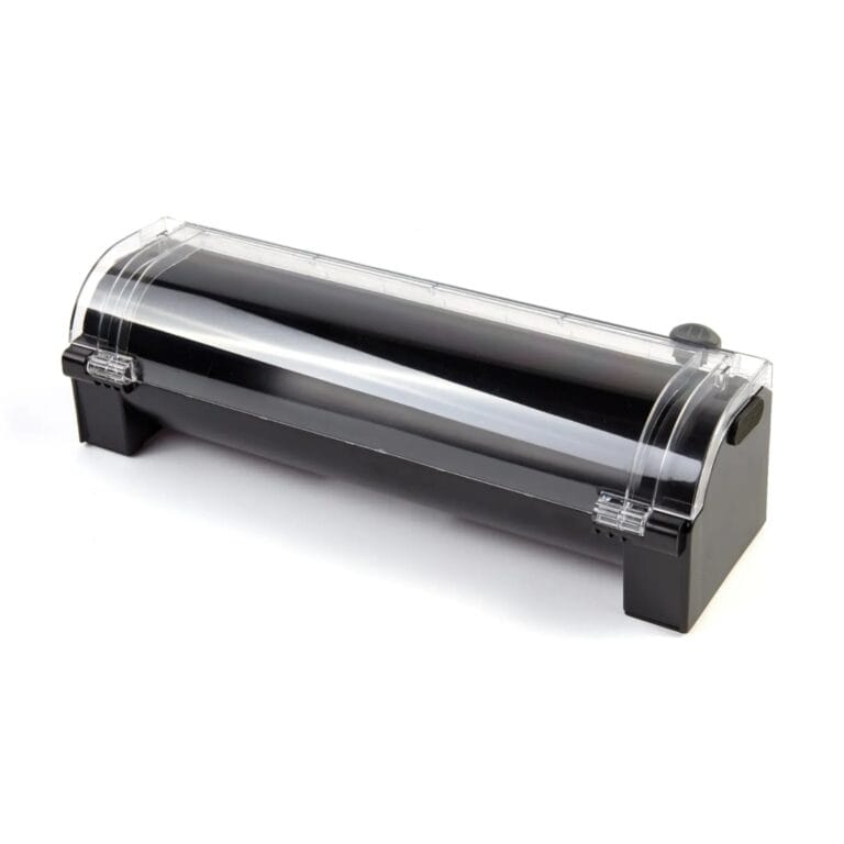 Vacuum roll dispenser with cutter